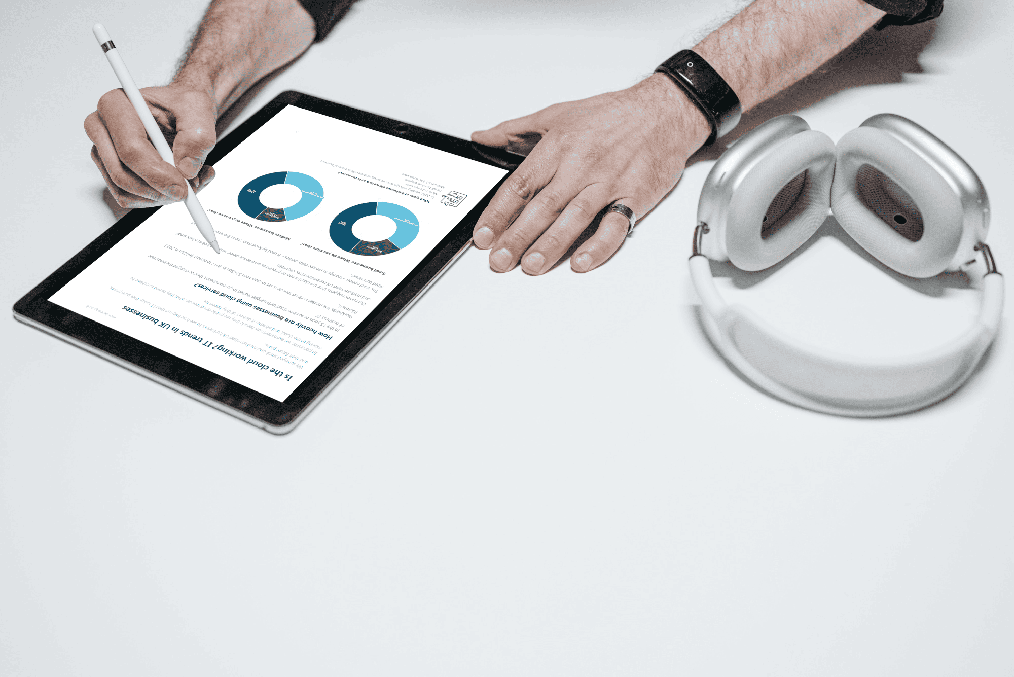 An ipad on a desk showing a page of the Beaming Report : Making the cloud work for UK businesses