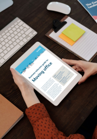 Moving office guide PDF shown on an Ipad help in someone's hands