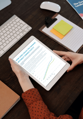 Cost of internet downtime report internal data page shown on an ipad at a desk